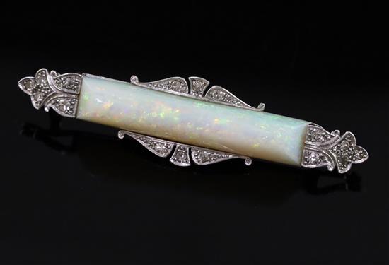 A 1940s/1950s white gold?, white opal and diamond set bar brooch, 49mm.